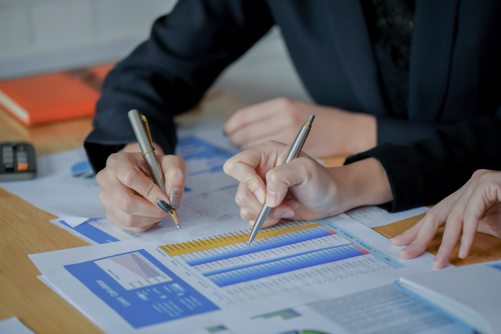 A finance and IT team reviewing telecom spend against the numbers